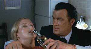 Agnieszka Wagner gets drink poured down her throat by hero Stevan Seagal in OUT OF REACH