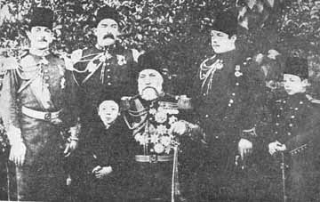 An aged Osman Pasha, with his sons