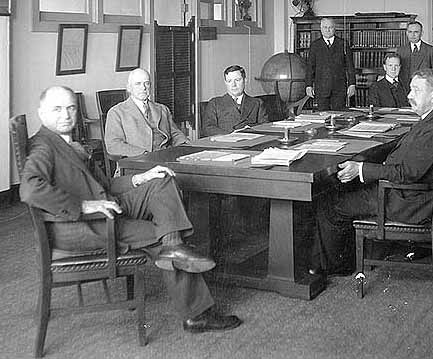 Rear Admiral Mark L. Bristol (far left), in a meeting at the Navy Department, Washington, D.C., 1932