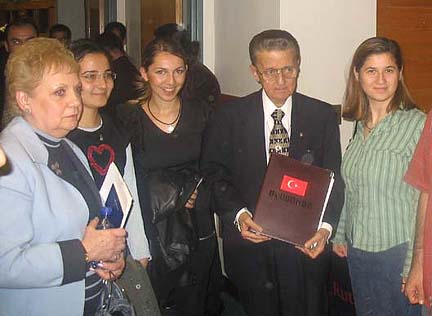Edward Tashji as an invited speaker for the Turkish-American student organization at Rutgers University in 2004. His wife, Mary, is at left.